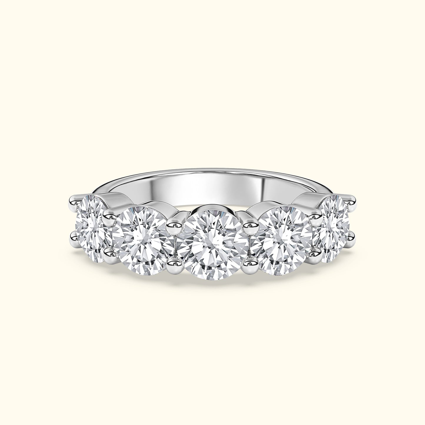 Six-stone diamond band ring set in polished white gold.