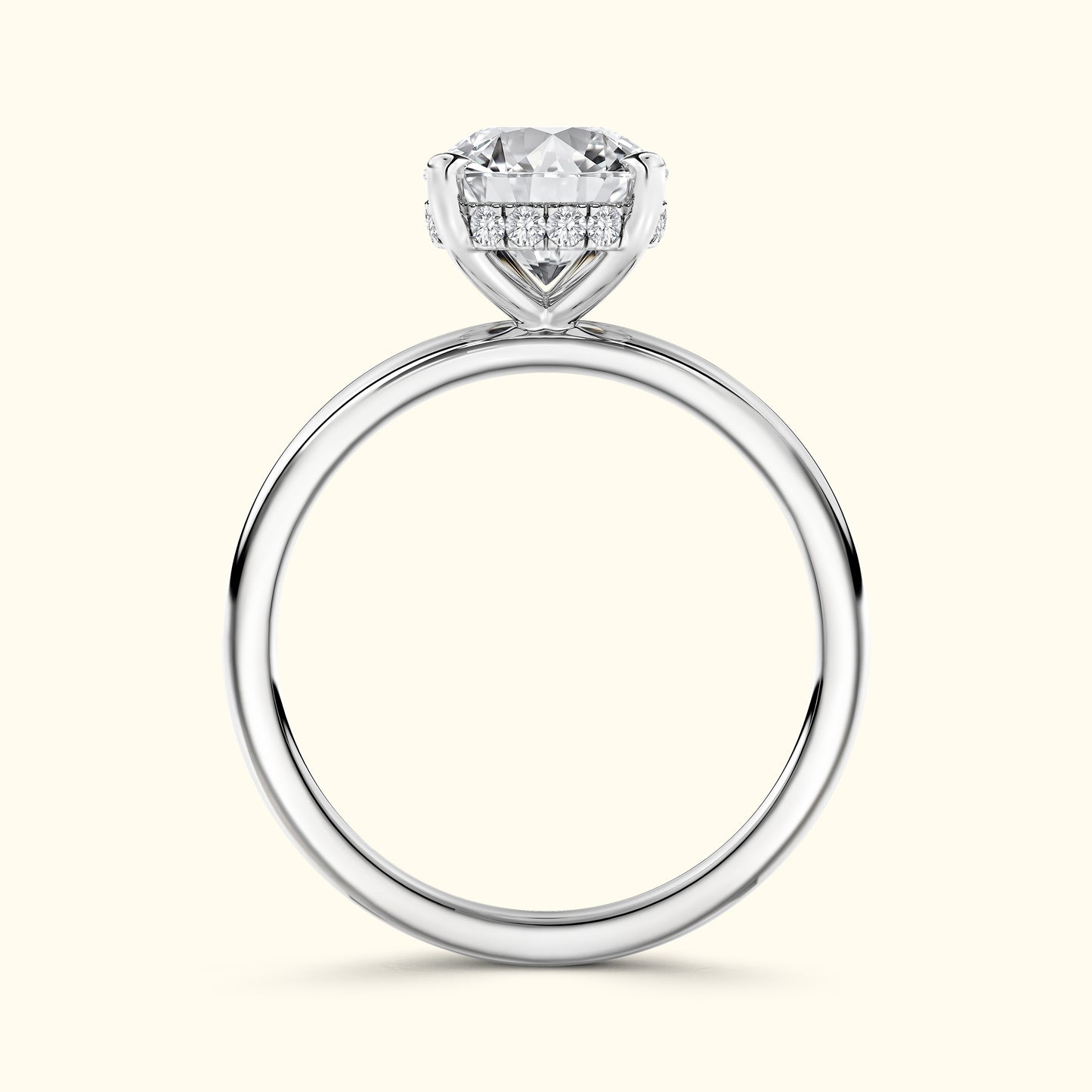 Elegant silver engagement ring featuring a large round diamond and smaller accent stones.