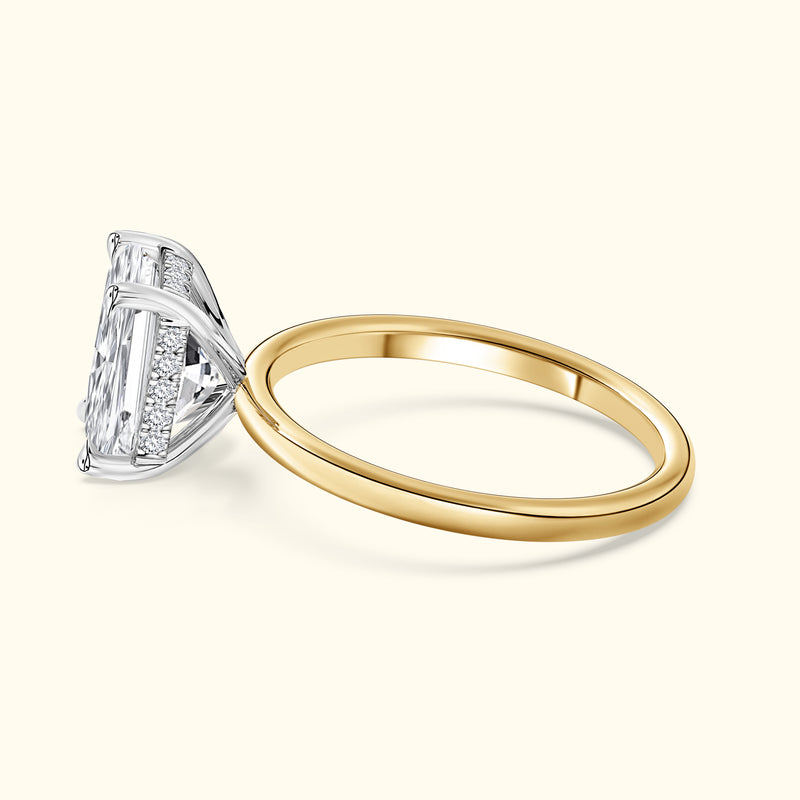 Elegant two-tone ring featuring a large, sparkling diamond at an angle.