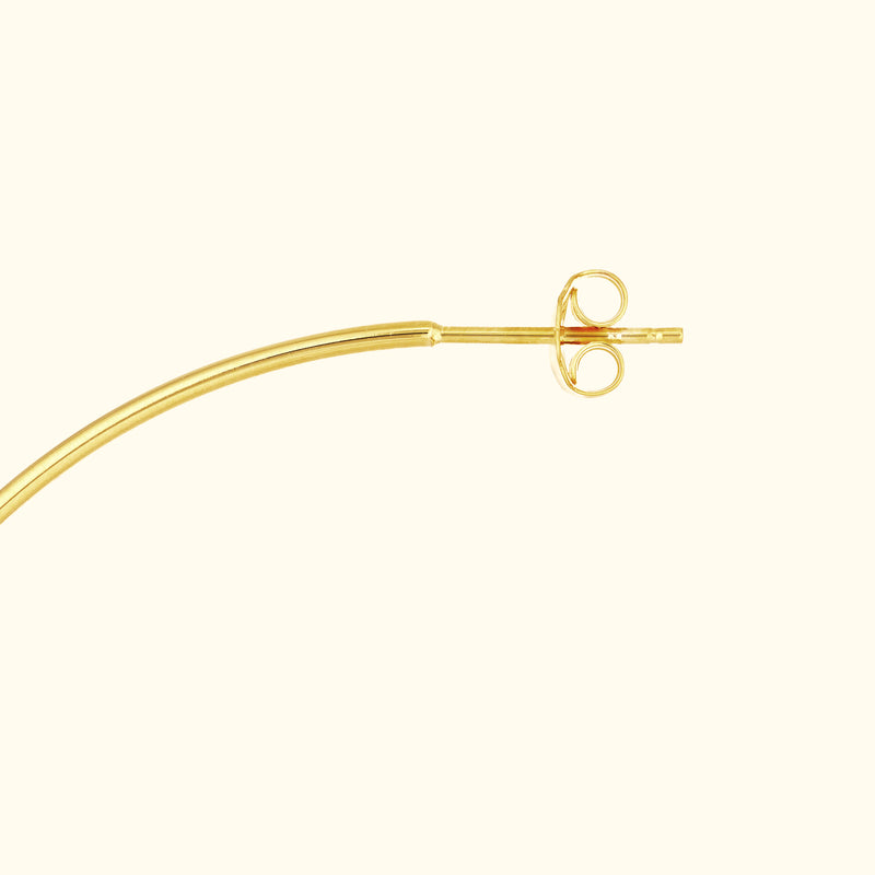 Golden earring hook with a smooth curve and a round loop at the top.