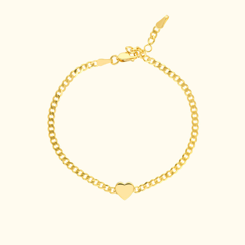 Gold chain bracelet with a heart charm, featuring a lobster clasp.