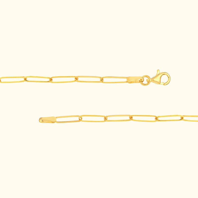 Gold link chain with a lobster clasp and elongated rectangular links.