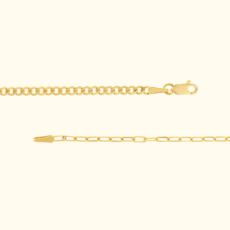 Shiny gold chain with a lobster clasp, featuring a sleek, simple design.