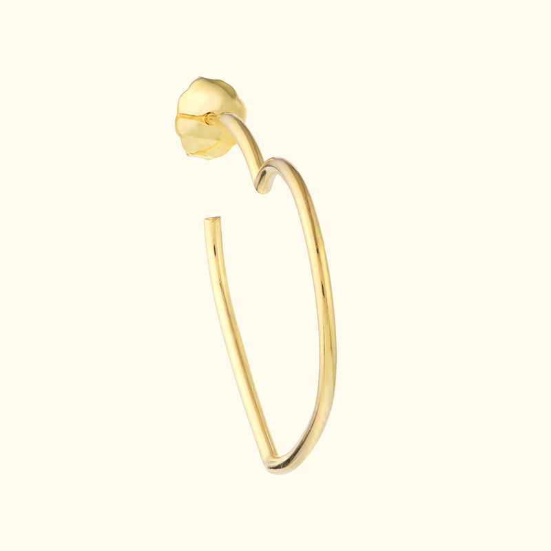 Gold hoop earring with a floral design, featuring a sleek, minimalist style.