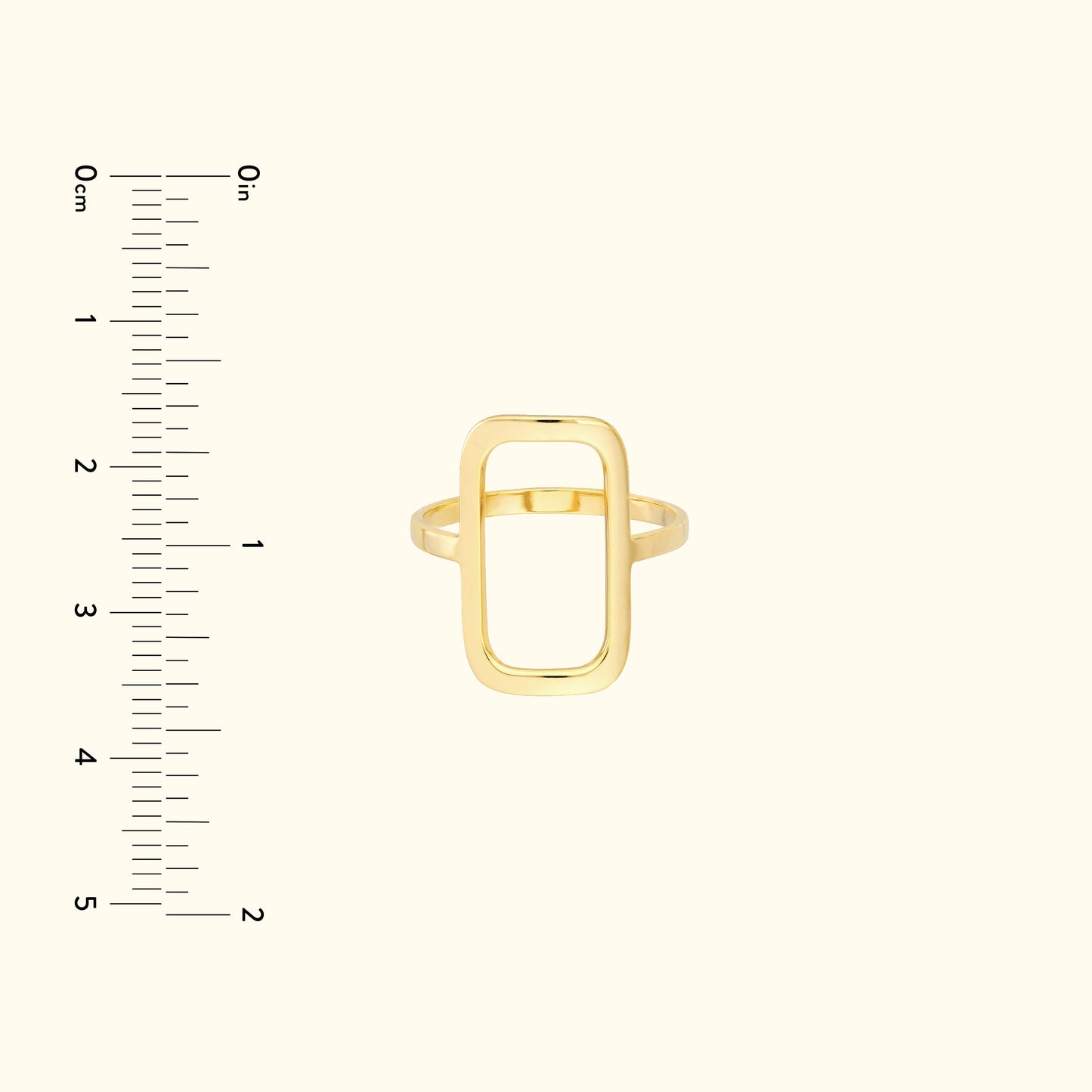 Gold geometric ring with an open rectangular design, displayed against a light background.