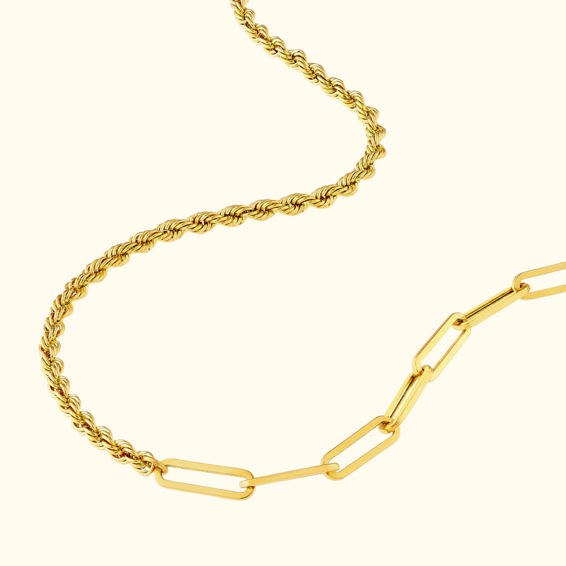 Two gold necklaces intertwined, one twisted rope design and one link chain style.