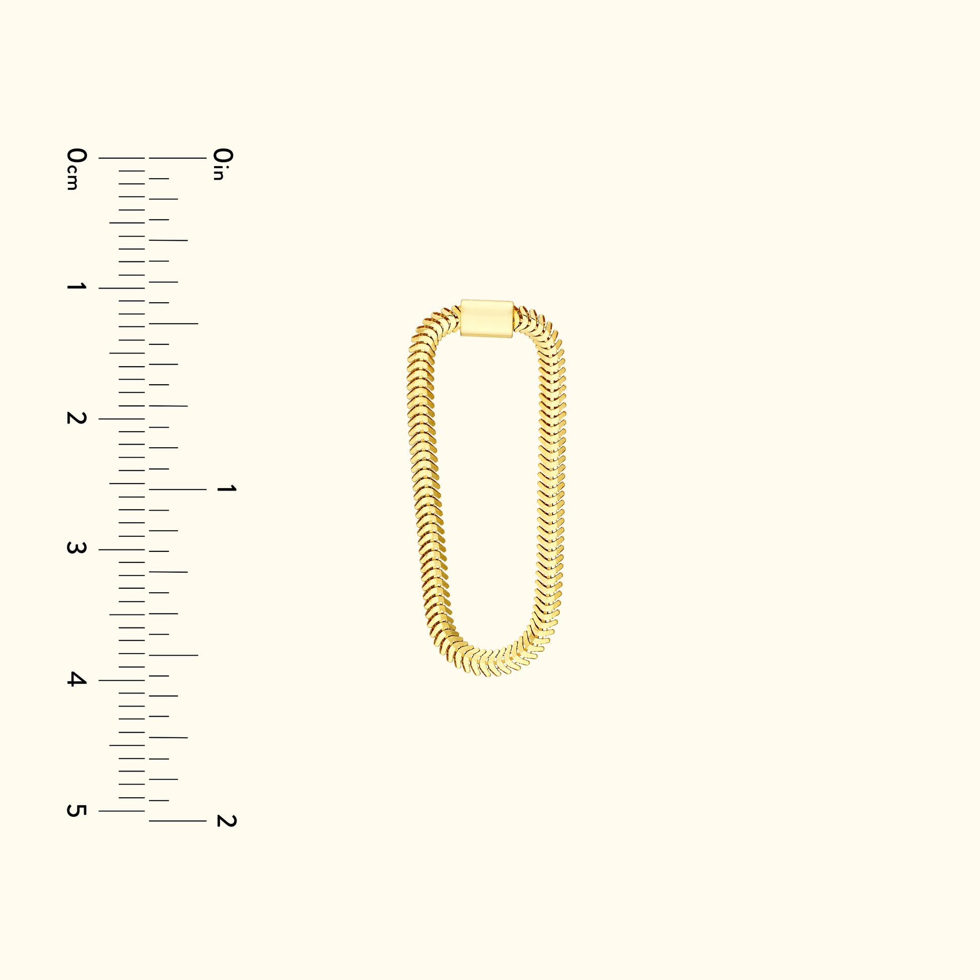 Gold chain link bracelet with a clasp, displayed against a light background.