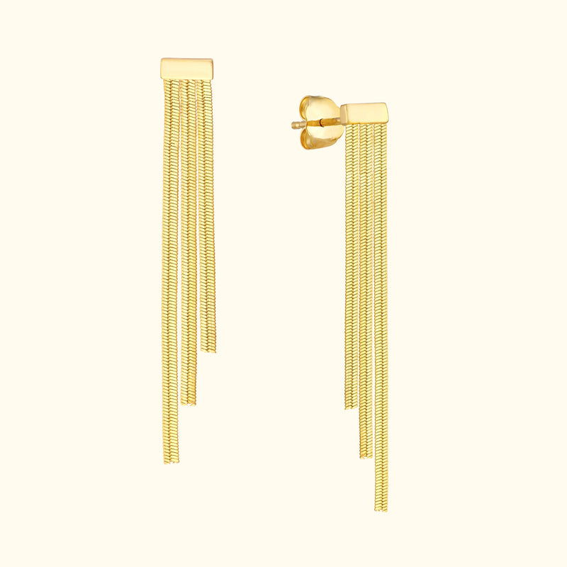 Gold tassel earrings with three delicate chains hanging from a rectangular post.