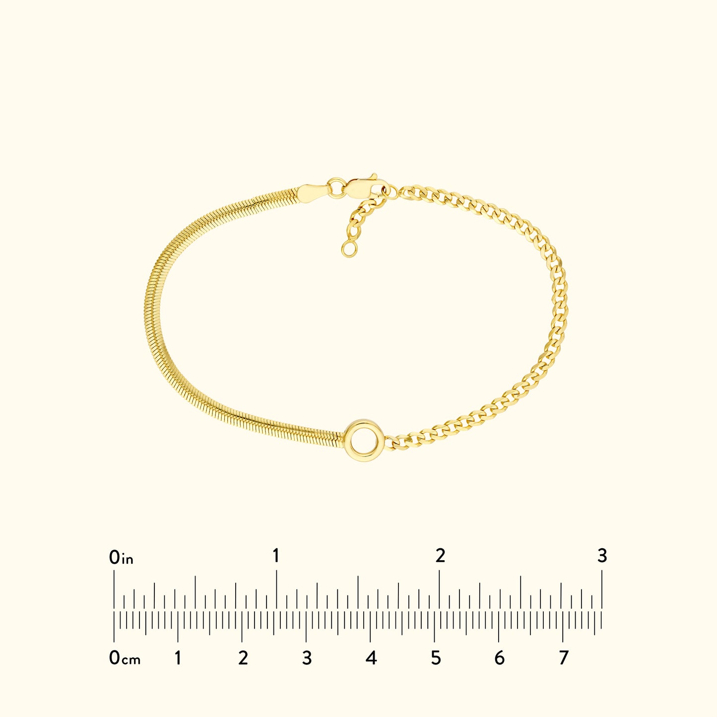 Gold bracelet featuring a mix of textured and smooth chains, with a circular clasp.
