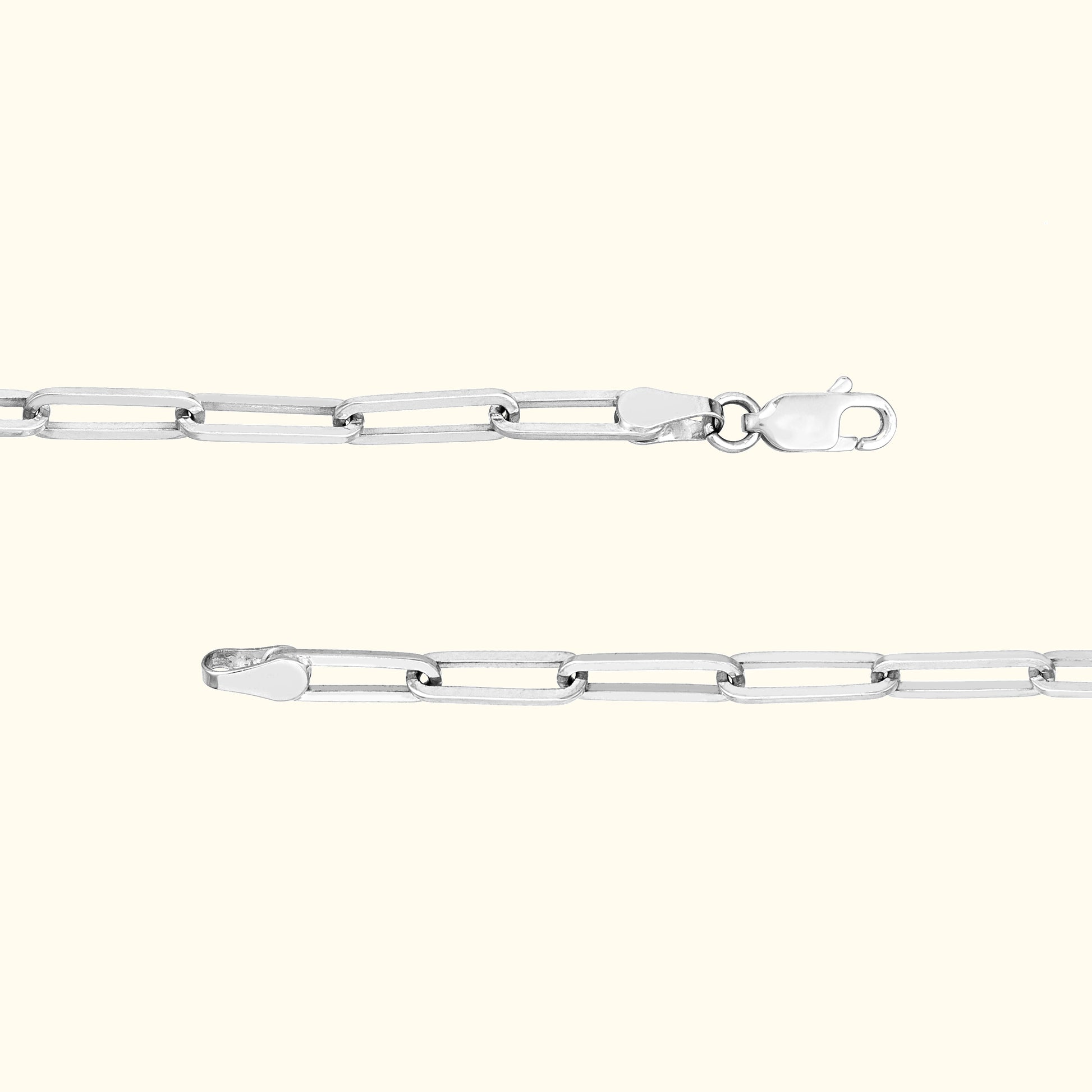 Silver link chain bracelet with a clasp, displayed horizontally and vertically.