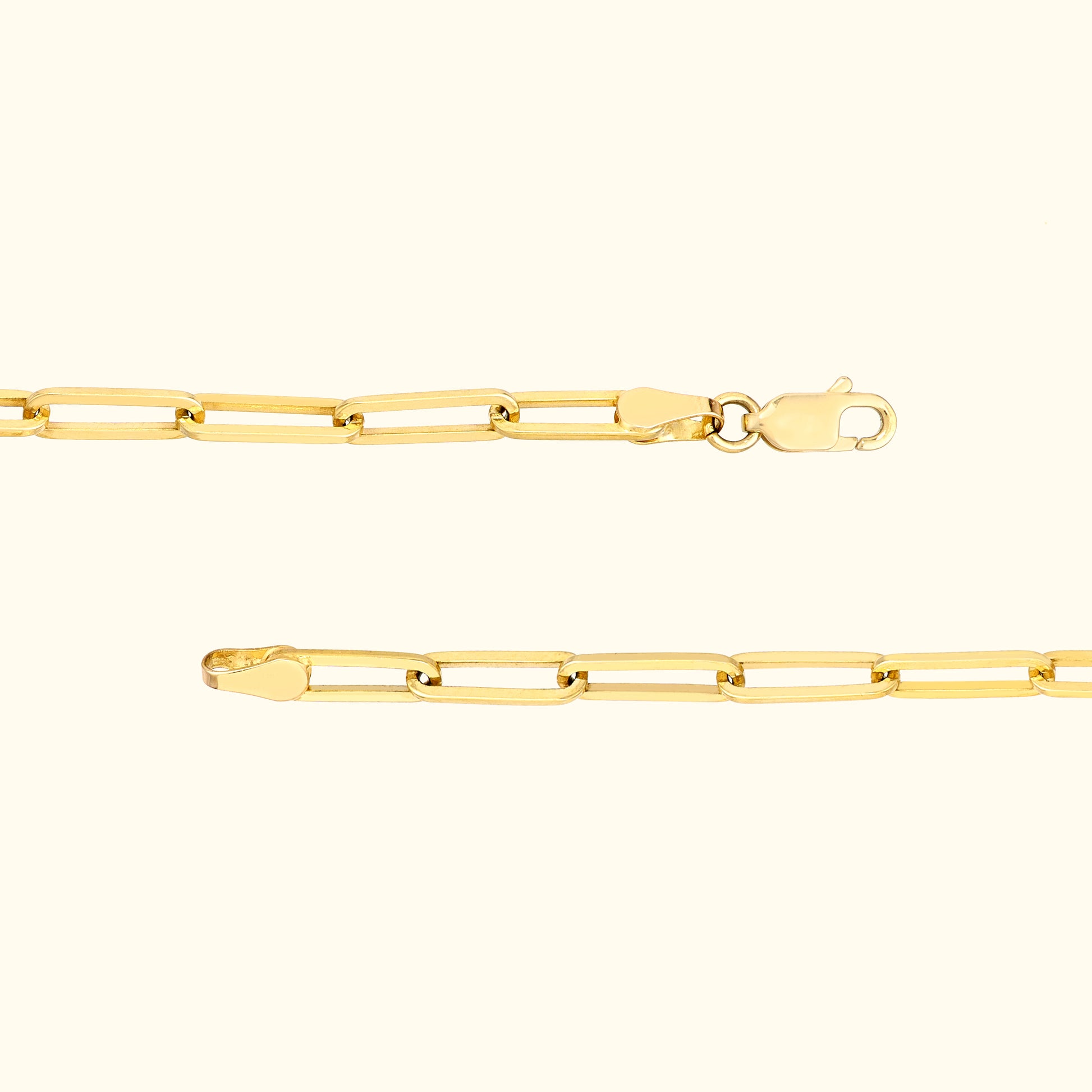 Gold chain necklace with elongated links and a lobster clasp.