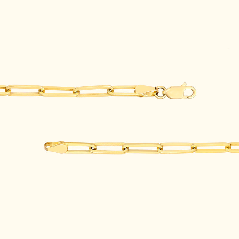 Gold chain necklace with elongated links and a lobster clasp.