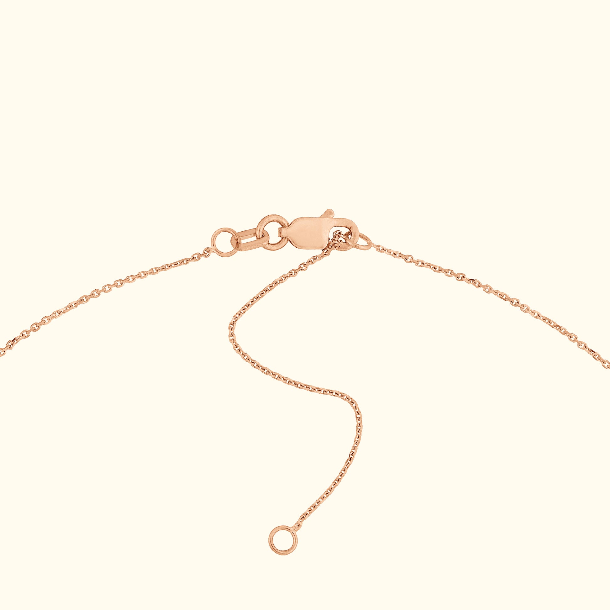Rose gold bracelet with a lobster clasp and adjustable chain.