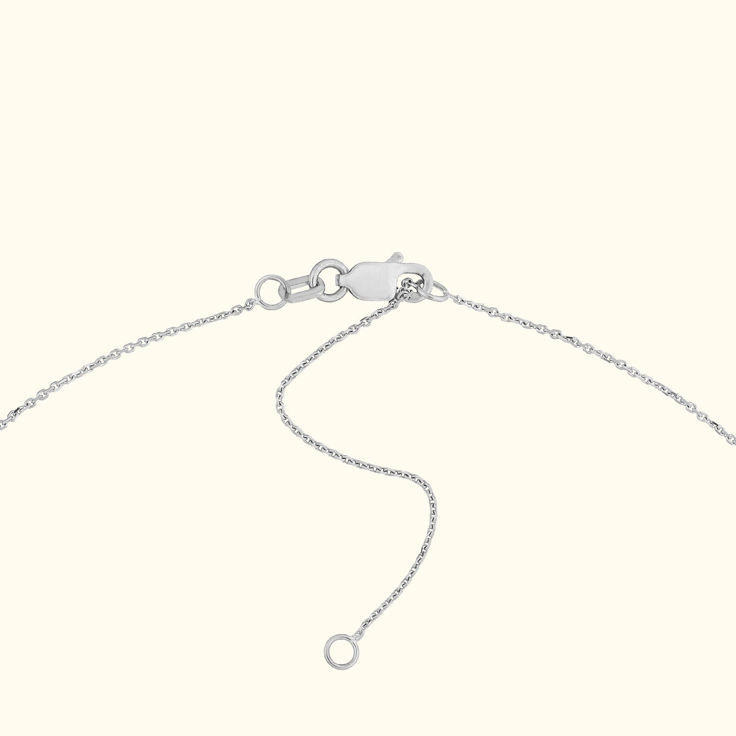 Silver chain bracelet with a clasp and an adjustable link.