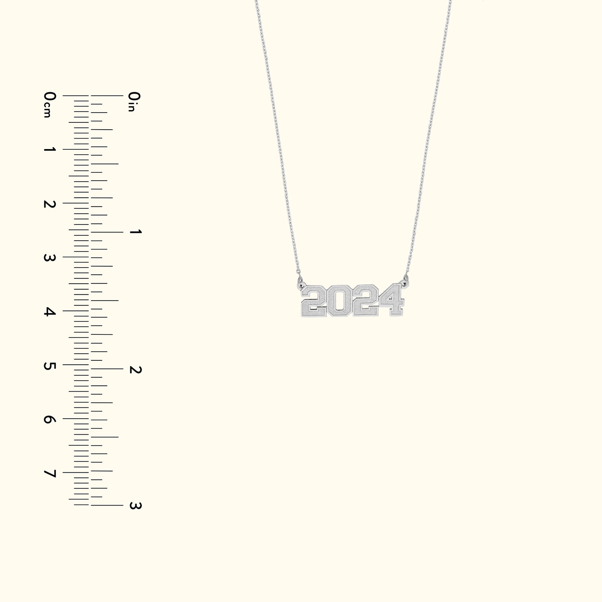 Silver necklace featuring the numbers "2024" as the pendant.