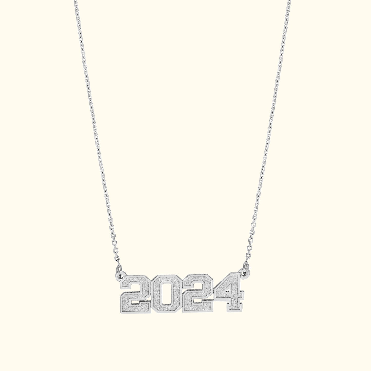 Silver necklace featuring the number "2024" as a stylish pendant.