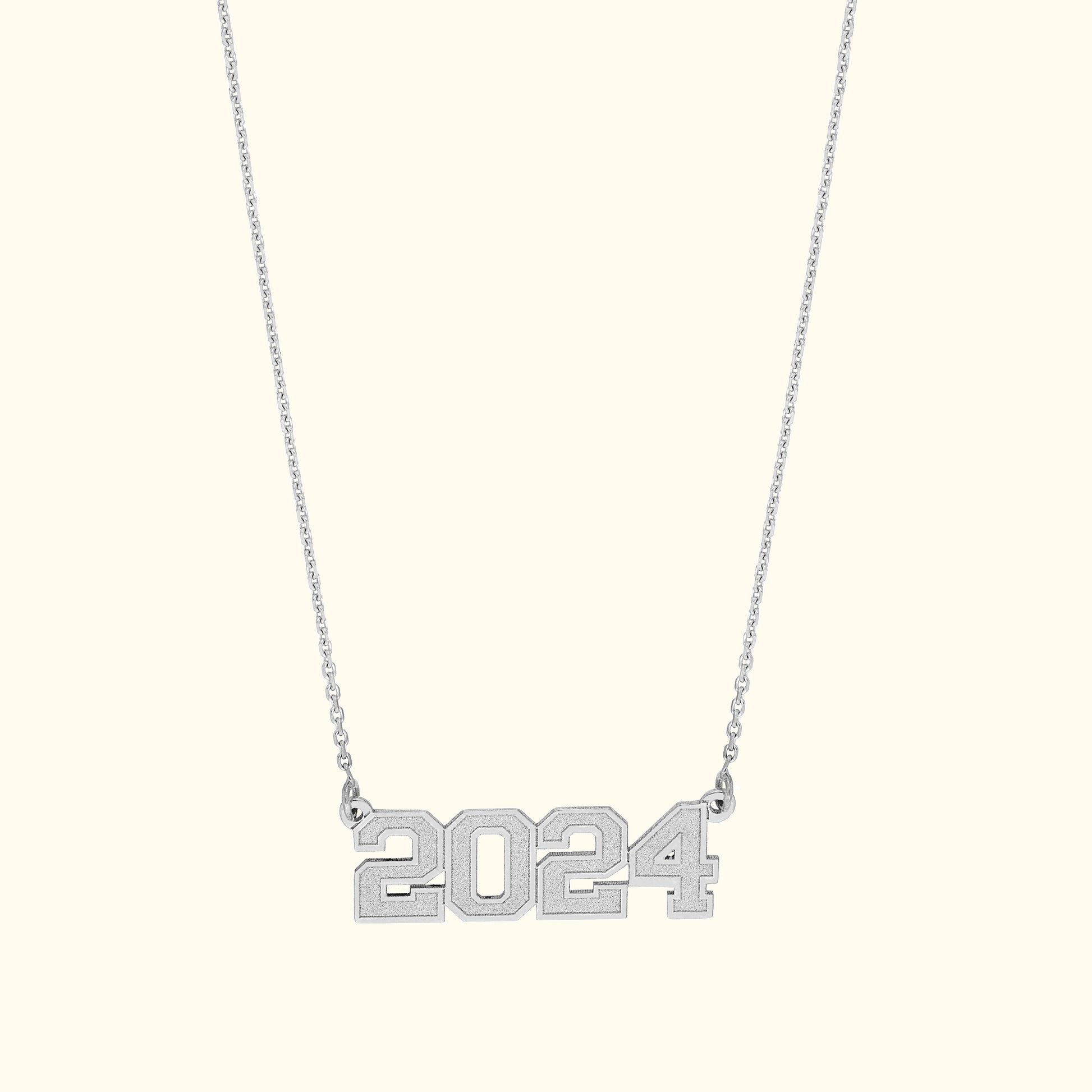 Silver necklace featuring the number "2024" as a stylish pendant.