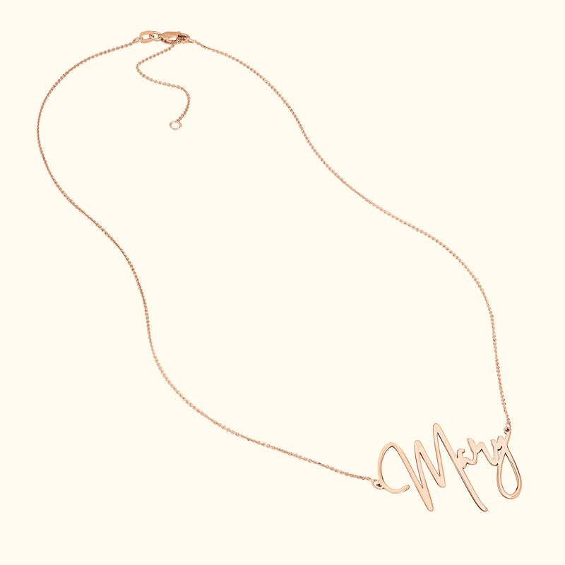 Rose gold personalized necklace featuring the name "Mary" in a cursive font.