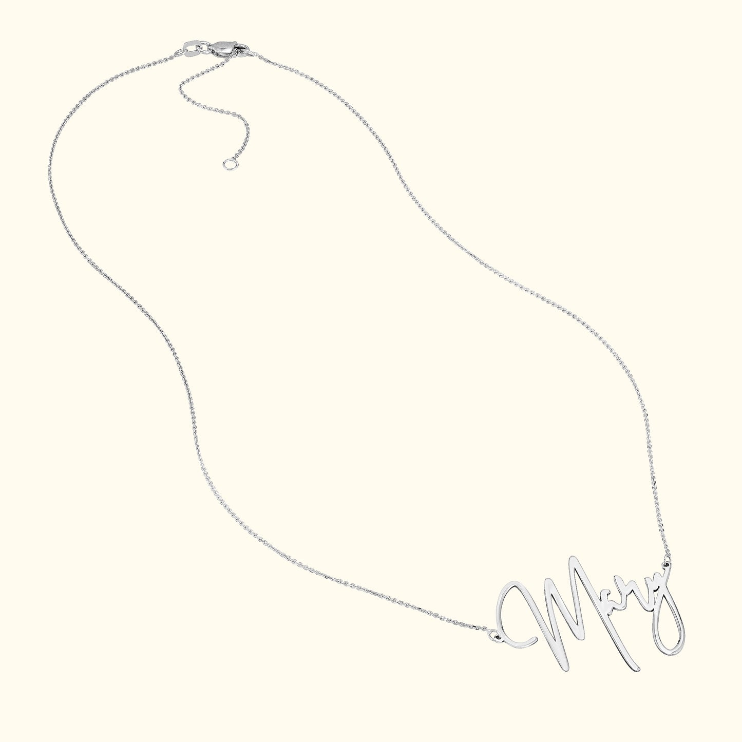 Silver necklace with the name "Mary" delicately scripted as the centerpiece.