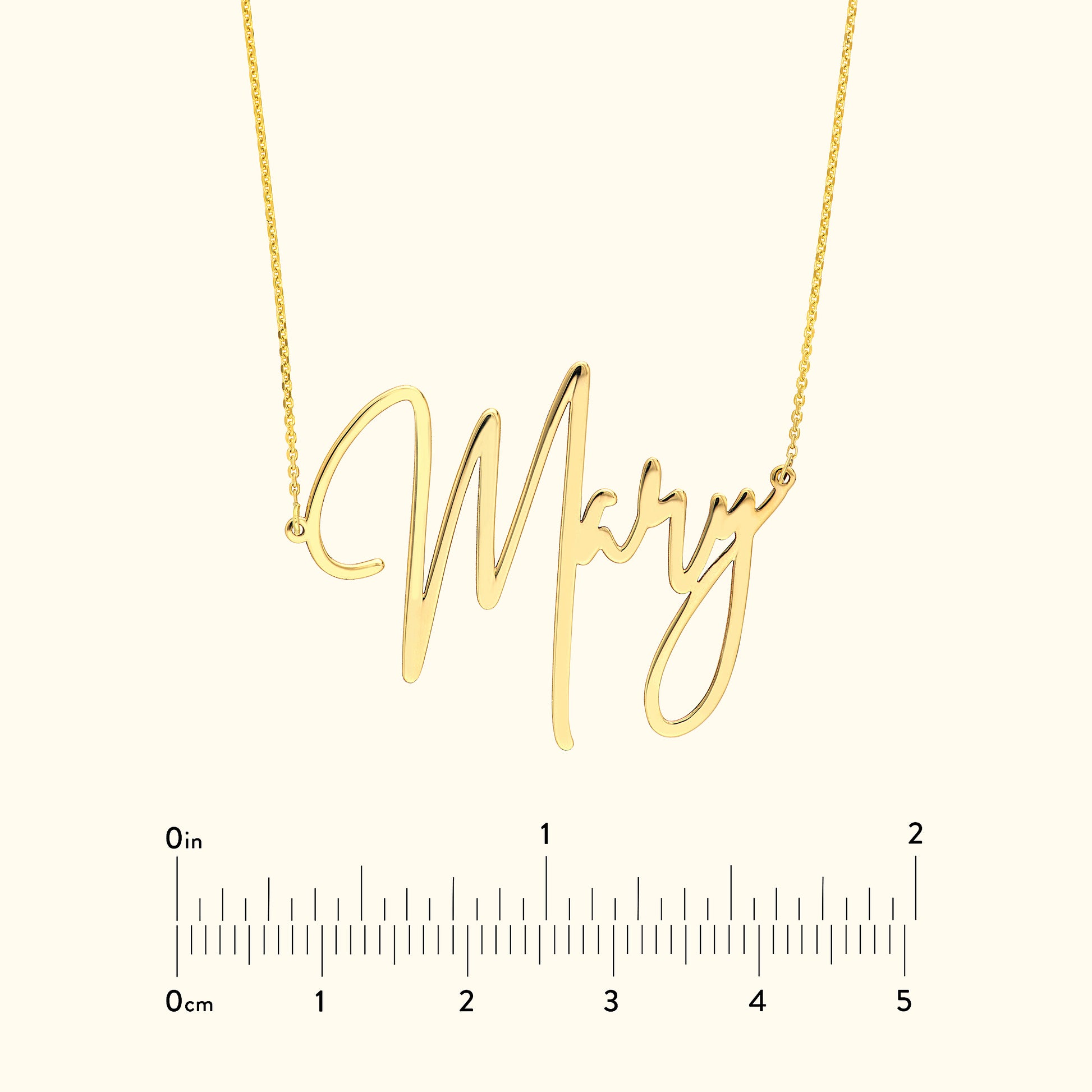 Gold necklace featuring a cursive nameplate that spells "Mary."
