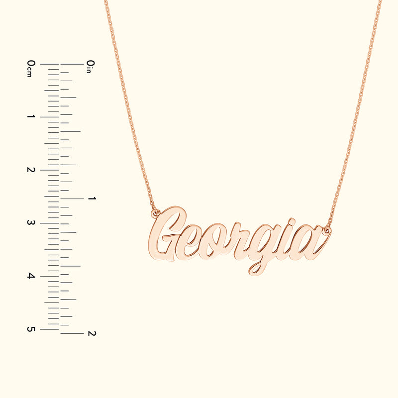Rose gold necklace featuring the name "Georgia," displayed against a light background.