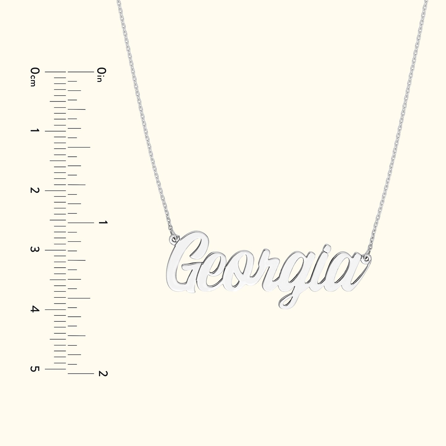 Silver necklace featuring the name "Georgia" in a cursive font.