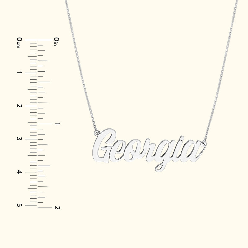 Silver necklace featuring the name "Georgia" in a cursive font.