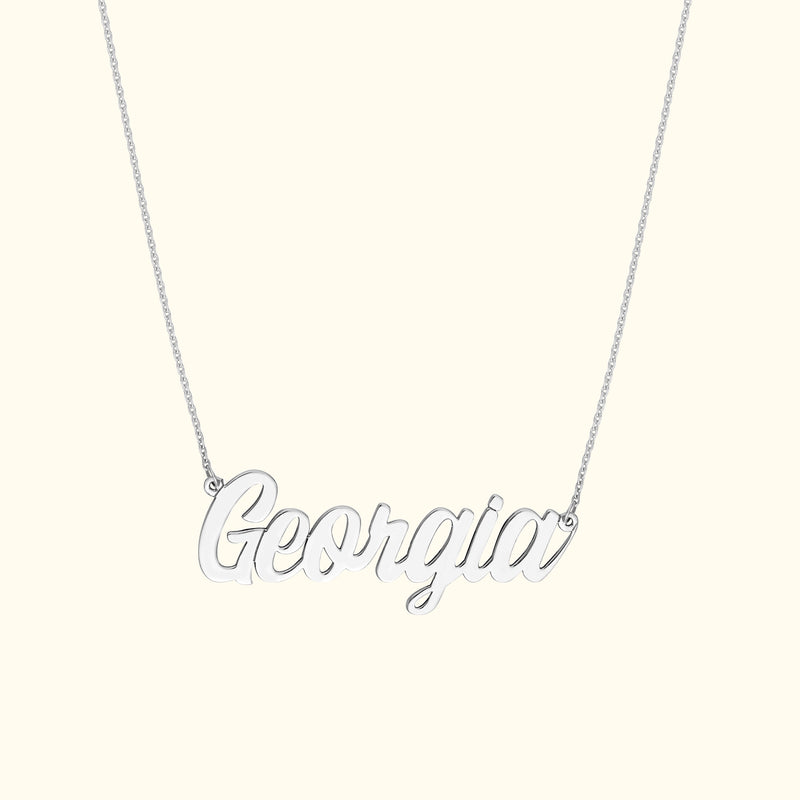 Silver necklace with the name "Georgia" elegantly scripted.