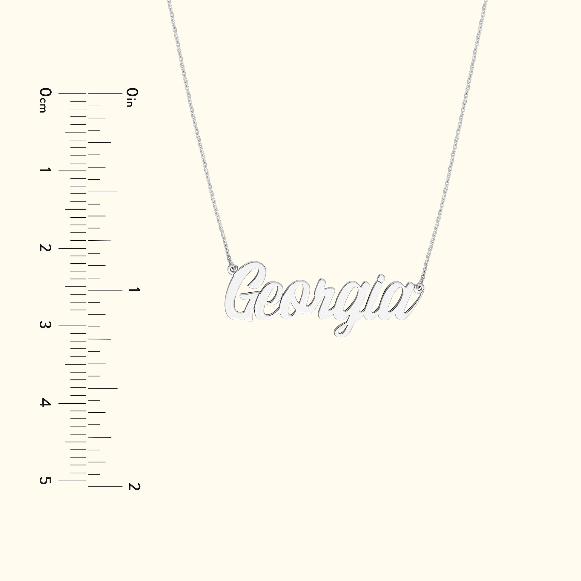 Silver name necklace with "Georgia" pendant on a delicate chain.