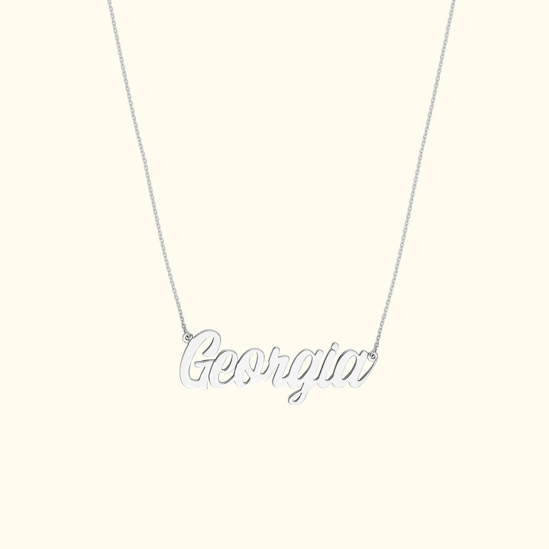 Silver necklace featuring the name "Georgia" in cursive lettering.