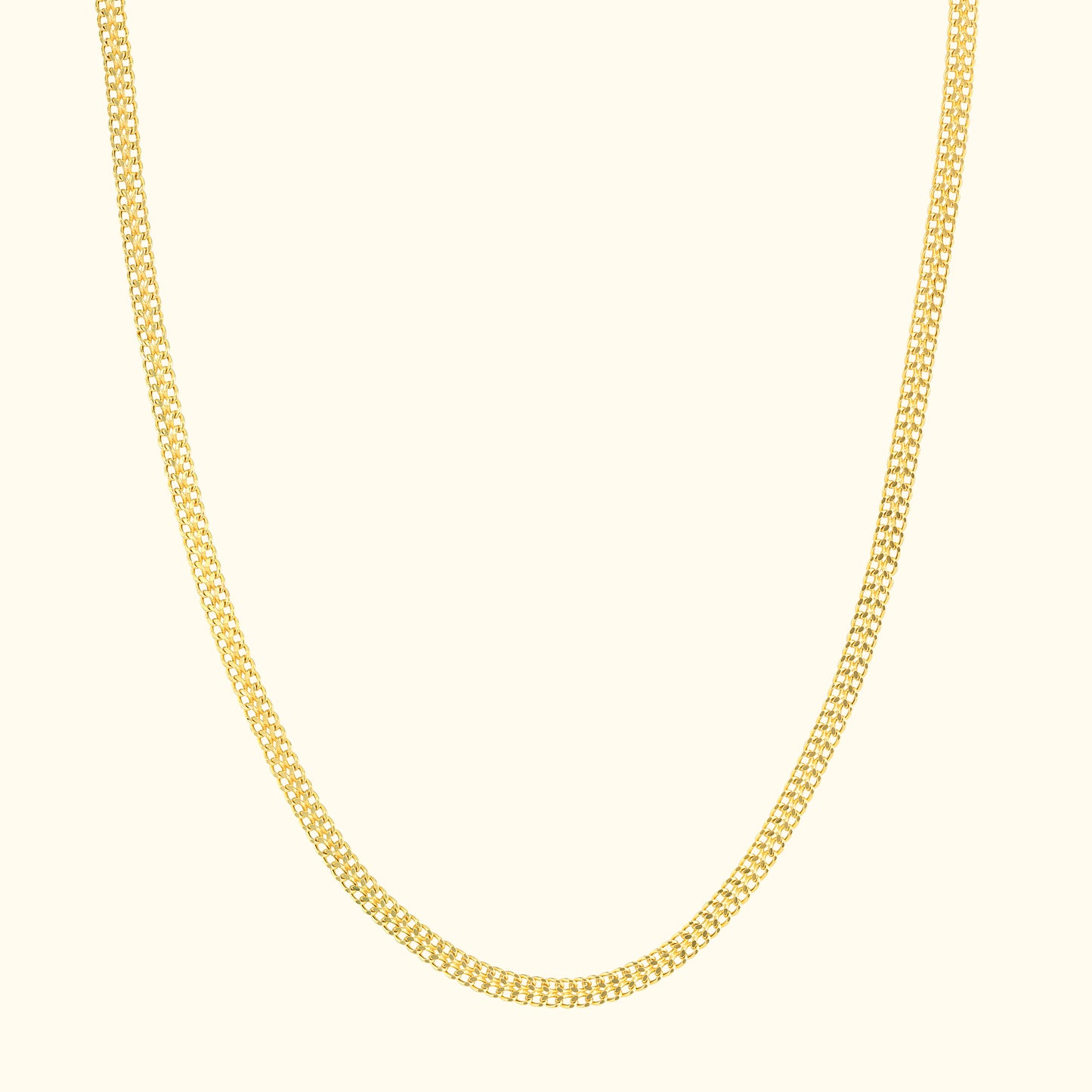 Elegant yellow gold chain necklace on a light background.