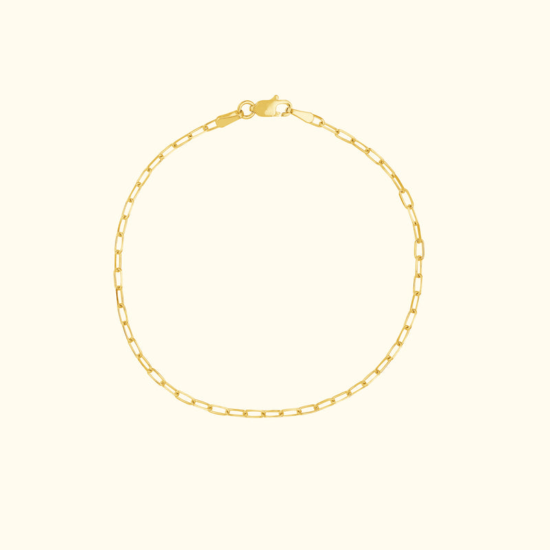 Delicate gold chain bracelet with interlocking links and a lobster clasp.