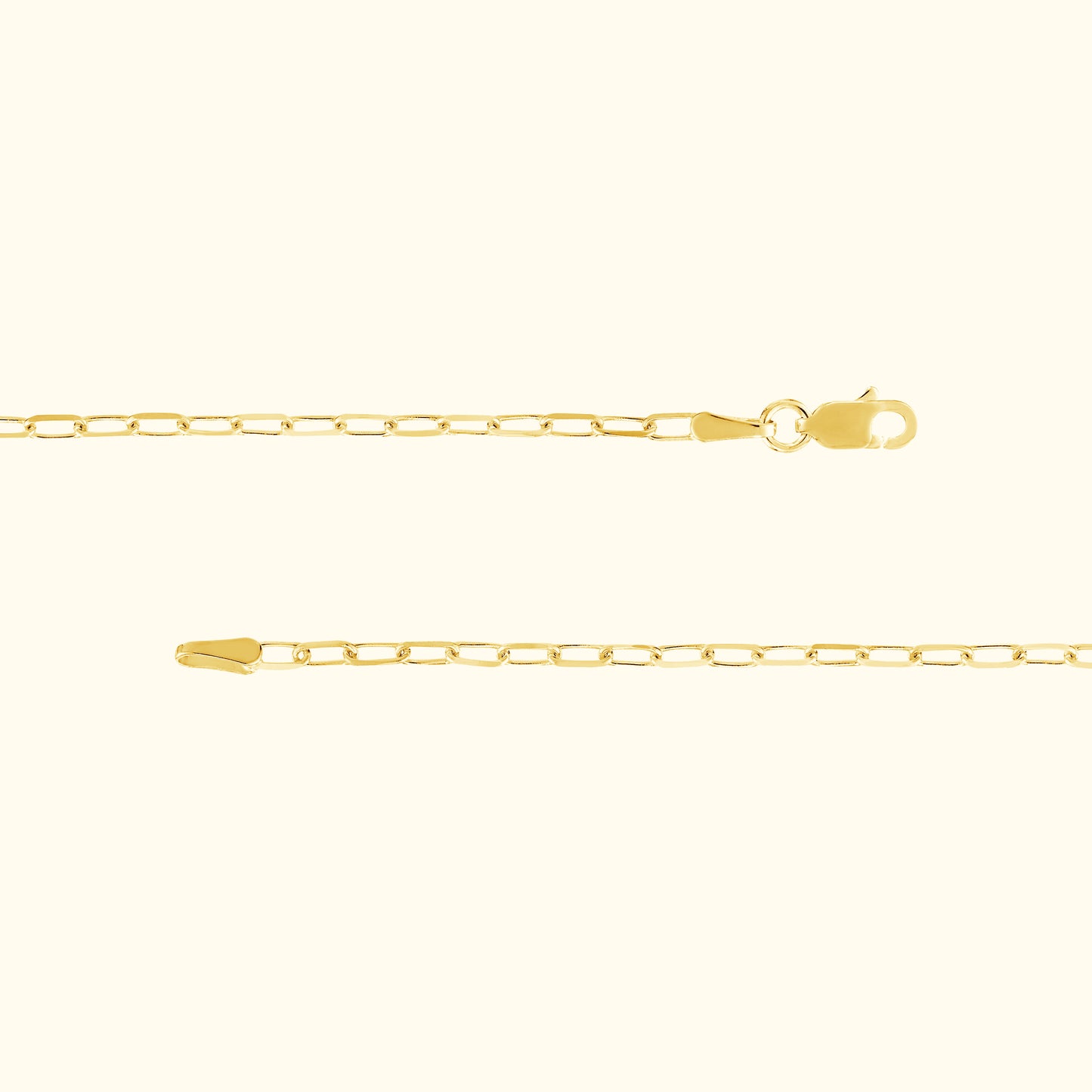 Delicate gold chain with a lobster clasp, displayed against a light background.