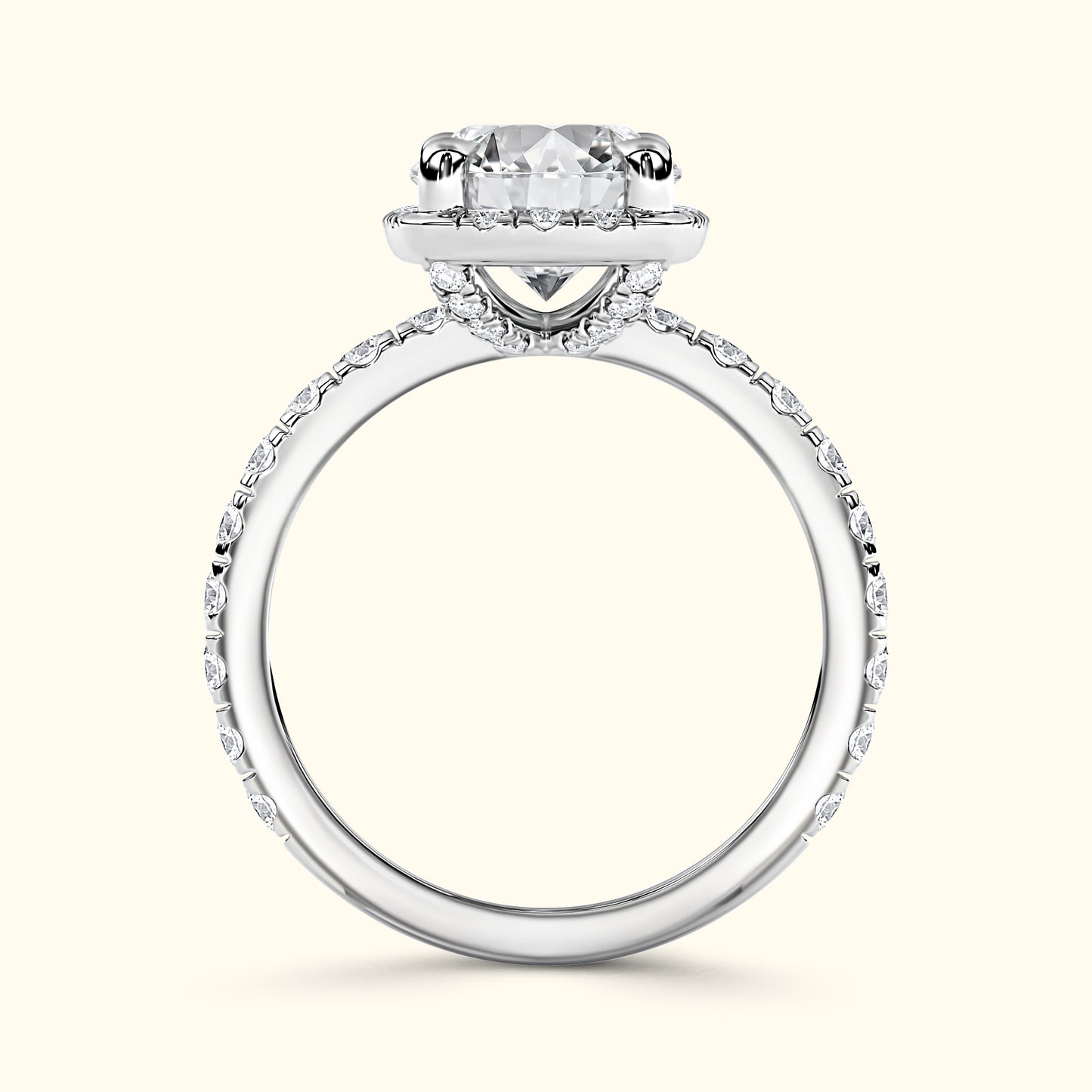 Elegant silver engagement ring featuring a large round diamond setting with smaller accents.