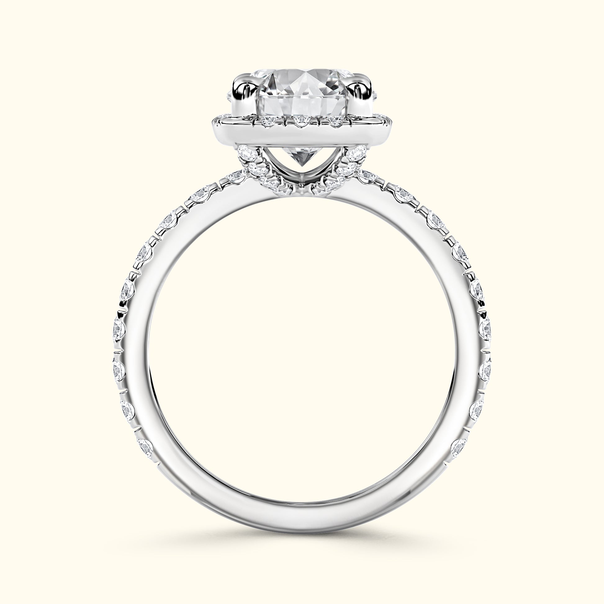 Elegant silver ring featuring a large round diamond atop a delicate band with small accents.