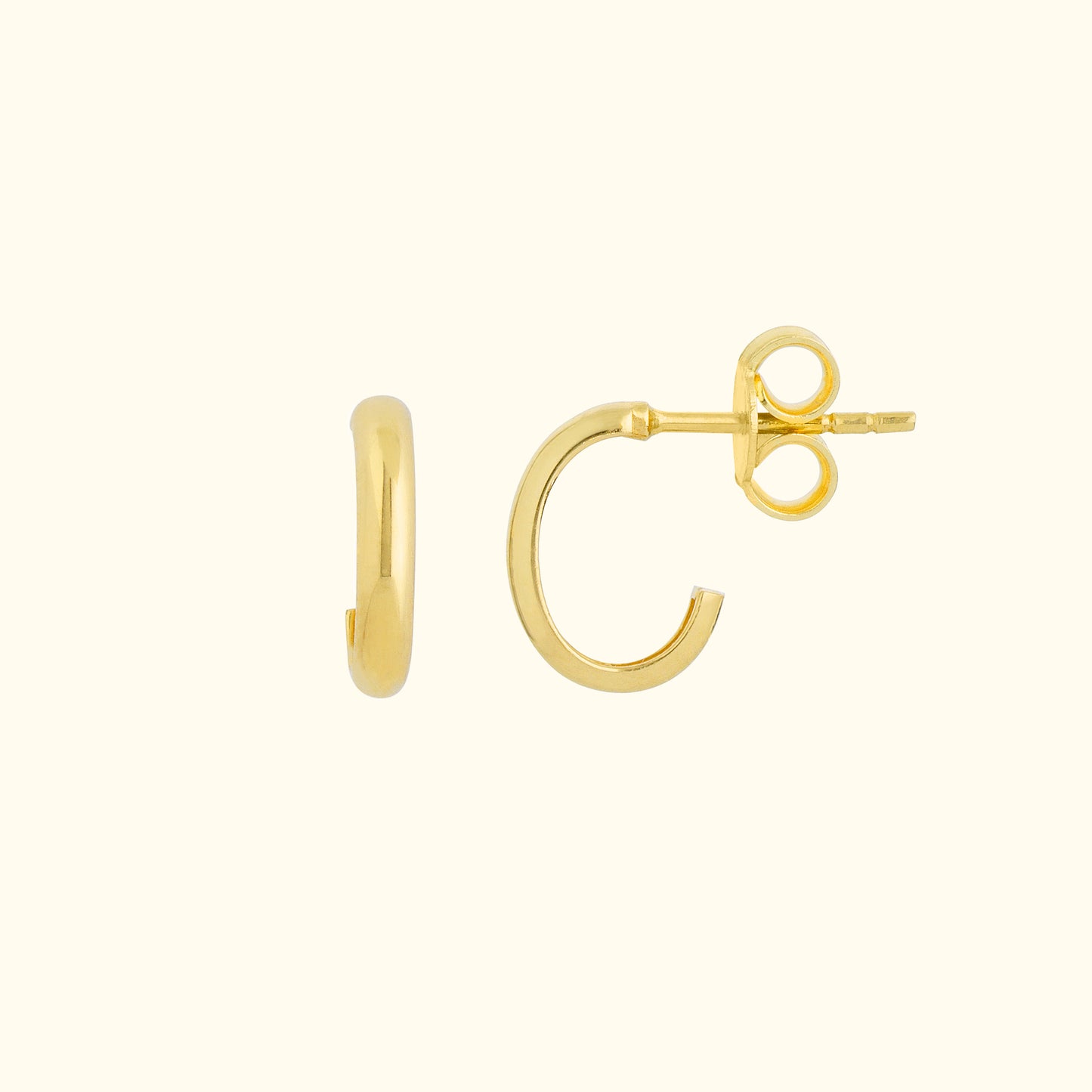 Gold hoop earrings with a smooth finish and secure post backing against a light background.