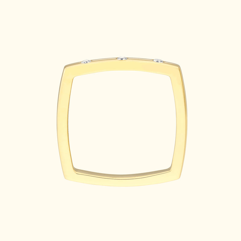 Gold geometric ring with three small diamonds set at the top.