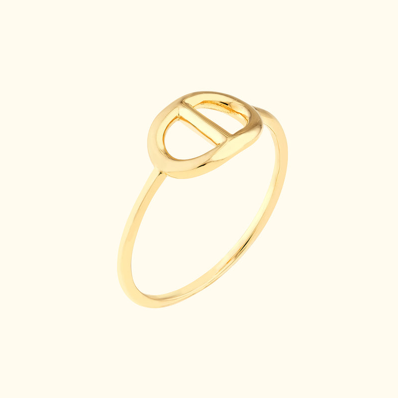 Simple gold ring featuring a minimalist buckle design.