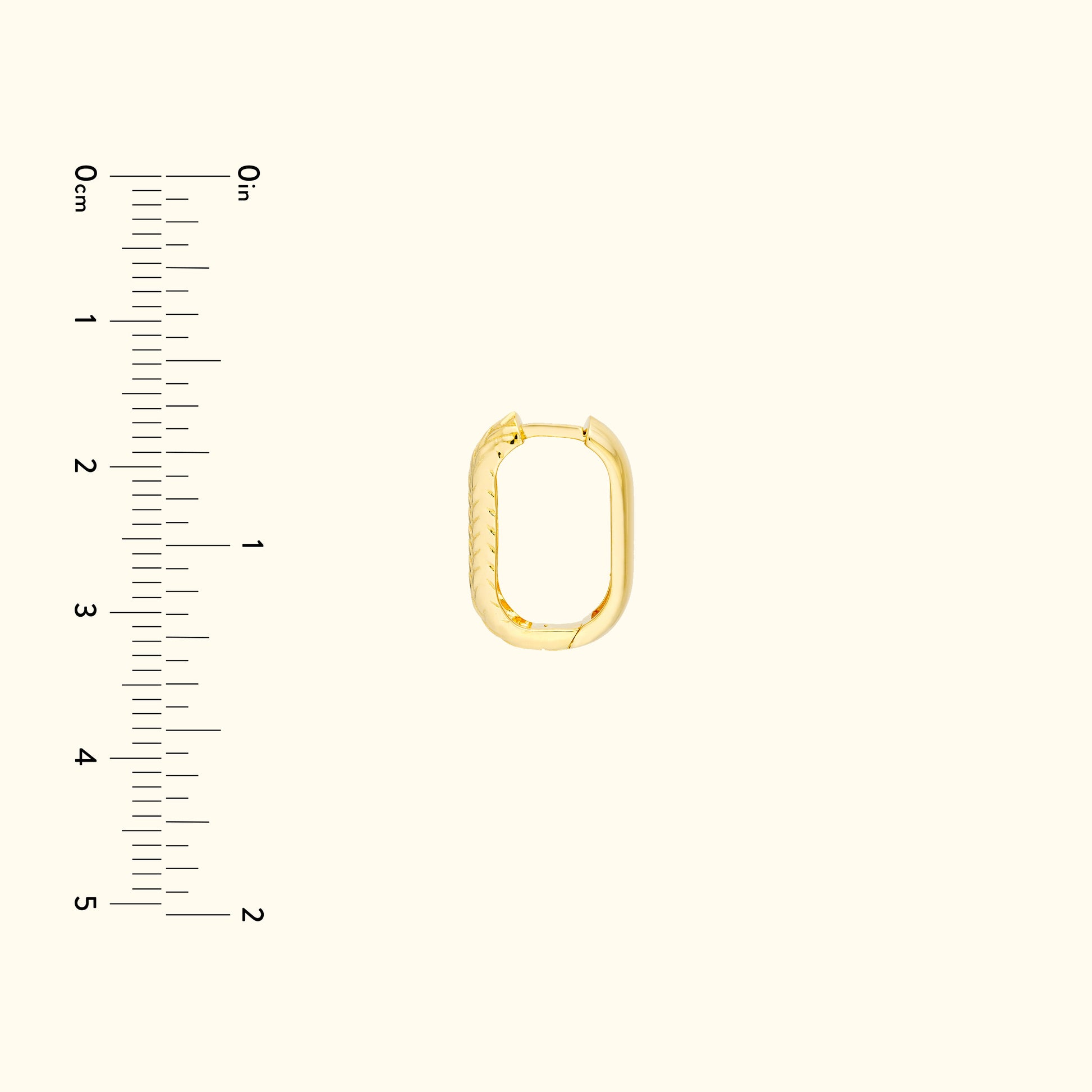 Gold oval-shaped jewelry connector with a textured edge on a light background.