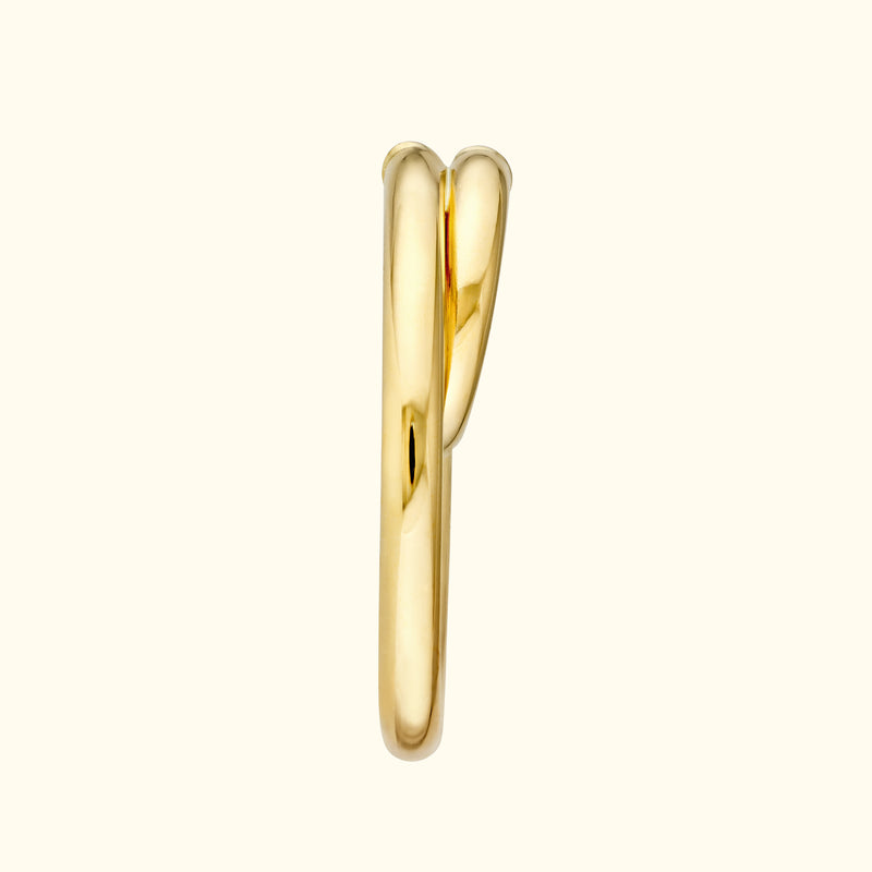 Sleek, intertwined gold ring with a polished finish.