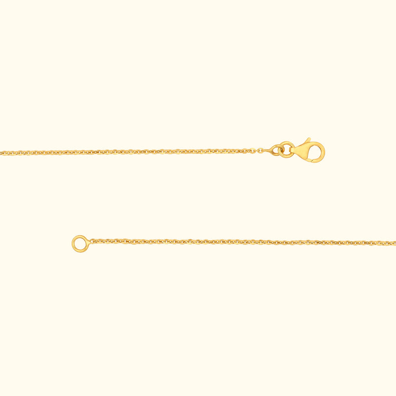 A delicate gold chain with a lobster clasp and a circular loop at the end.