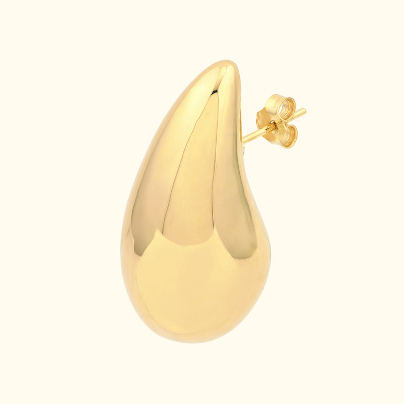 Polished gold teardrop earring with a simple post back.