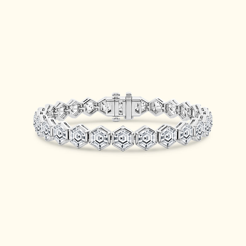 Silver hexagon-shaped bracelet with sparkling accents, showcasing a sleek design.