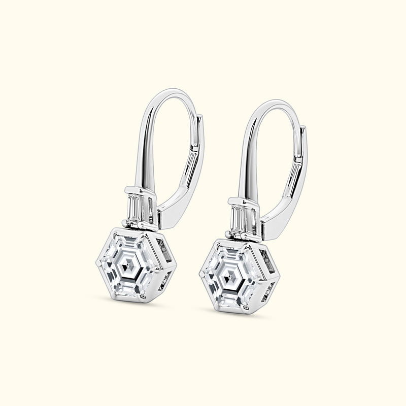 Elegant silver drop earrings featuring hexagonal clear gemstones.