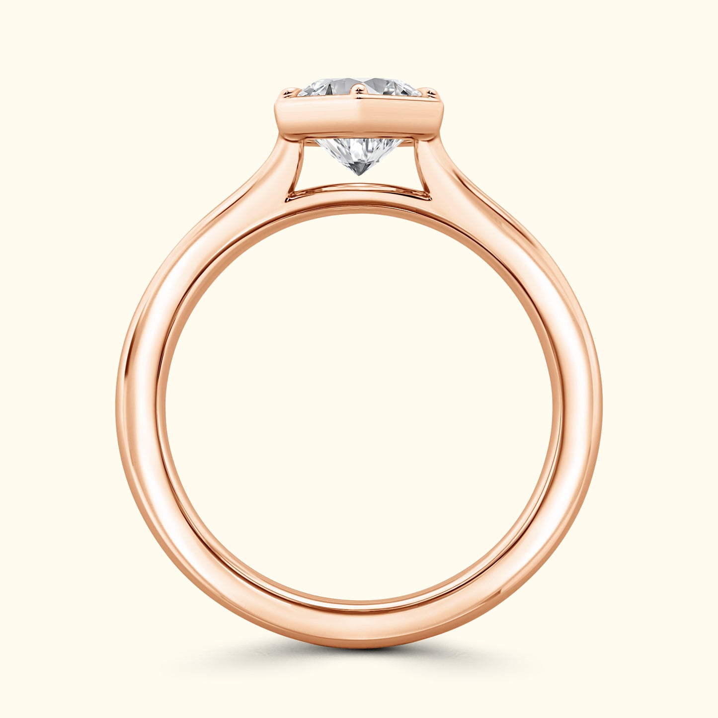 Rose gold engagement ring featuring a sparkling diamond at the center.