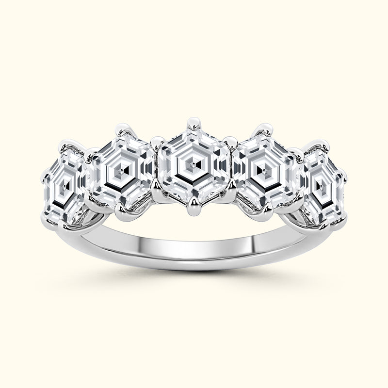 Stylish silver ring featuring five hexagonal diamond settings.