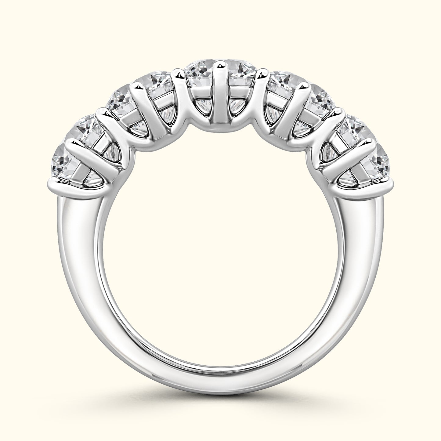Silver band ring adorned with five sparkling diamonds in a prong setting.