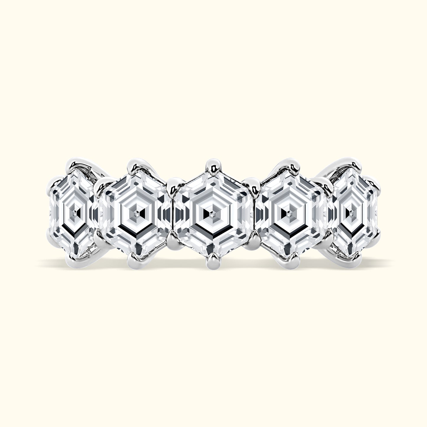 Elegant silver ring featuring hexagonal diamond patterns in a polished finish.
