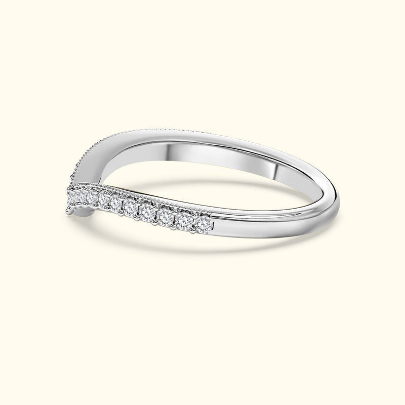 Elegant silver ring with a twisted band and small diamonds along one side.