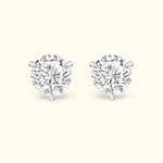 Elegant diamond stud earrings with a classic four-prong setting.